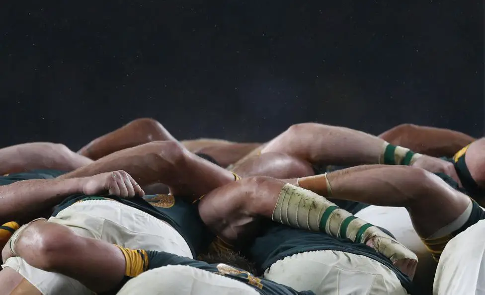 South Africa players compete in a scrum with New Zealand players during their Rugby World Cup Semi-Final match at Twickenham in London