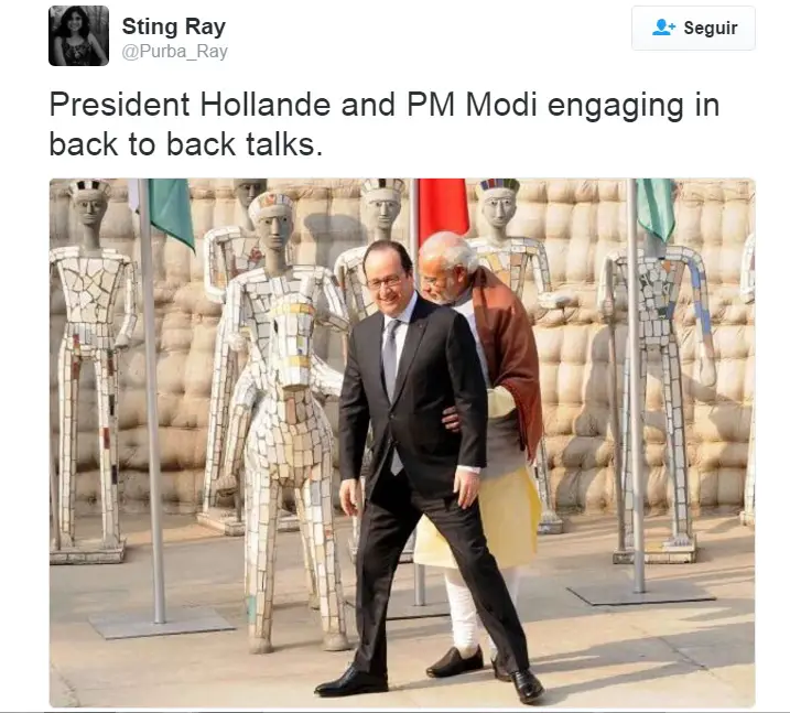 Tweet con una imagen del Presidente de Francia y el Primer Ministro Indio quién le susurra algo por la espalda