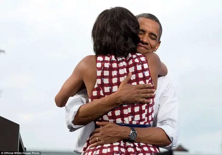 3a3f8f7c00000578-3926100-august_15_2012_the_president_hugs_the_first_lady_after_she_had_i-a-16_1478871703716-2